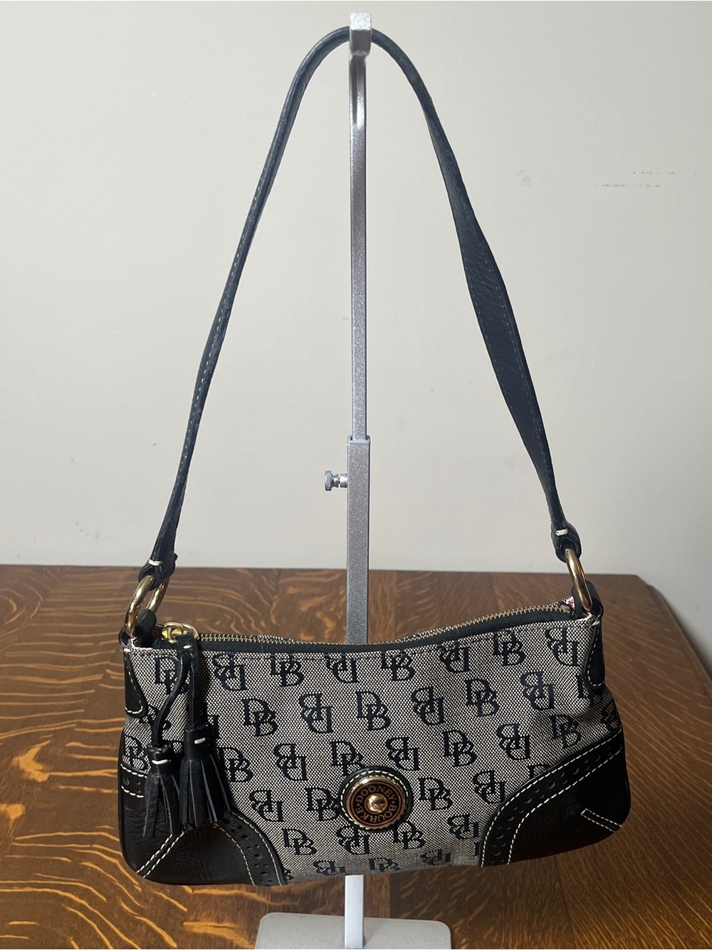 Dooney & Bourke Vintage Black and Gray Monogram Logo Shoulder Baguette bag.